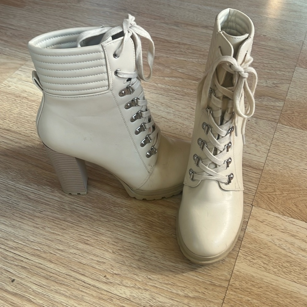 Off white, heeled, laced-up boots